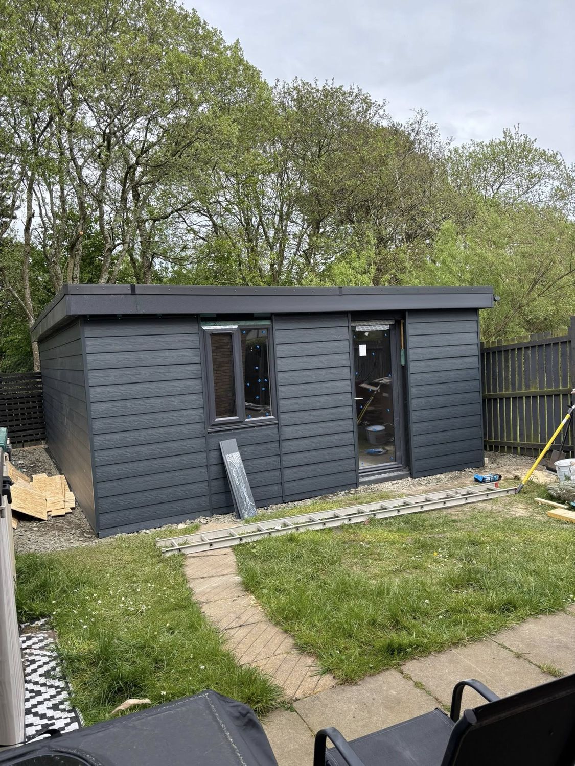 Grey composite-clad garden room