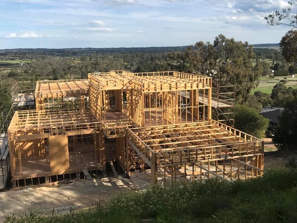Timber-framed two storey house structure